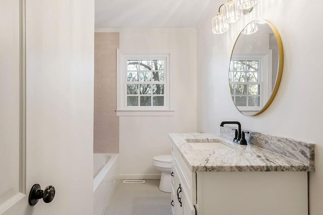 bathroom featuring tile patterned flooring, vanity, and toilet