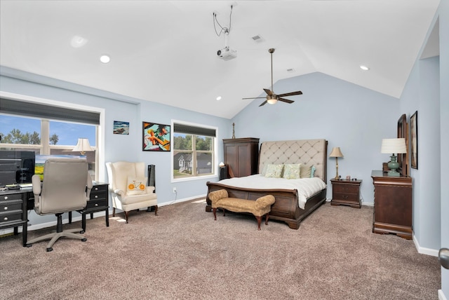 carpeted bedroom featuring ceiling fan and vaulted ceiling