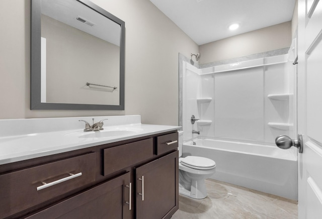 full bathroom with shower / tub combination, vanity, and toilet