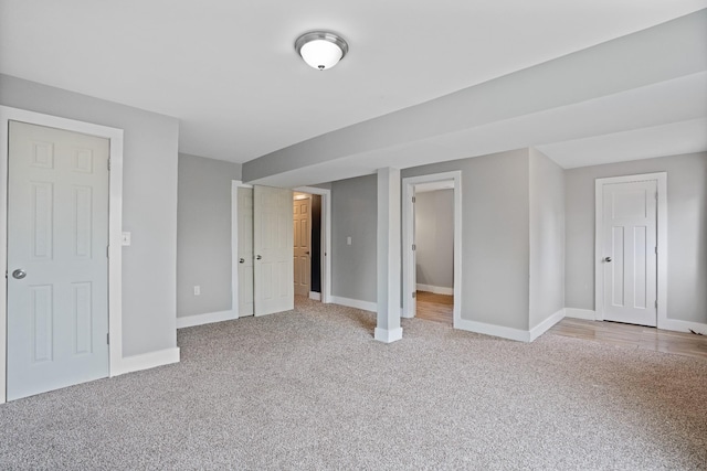 unfurnished bedroom with light colored carpet