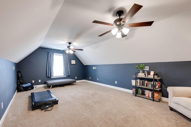 interior space featuring carpet, ceiling fan, and lofted ceiling