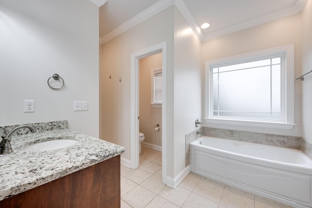 bathroom featuring crown molding, a washtub, vanity, and toilet