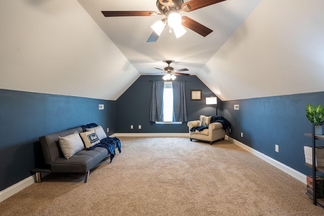 sitting room with carpet flooring, ceiling fan, lofted ceiling, and baseboards