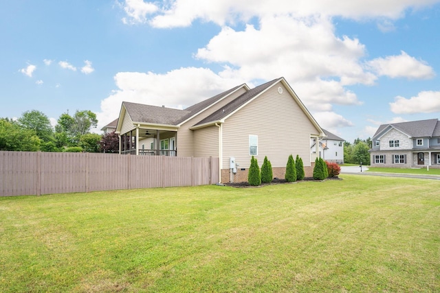 view of property exterior featuring a ceiling fan