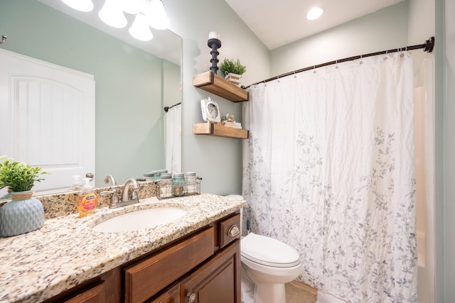 full bath with toilet, vanity, a shower with shower curtain, and a chandelier