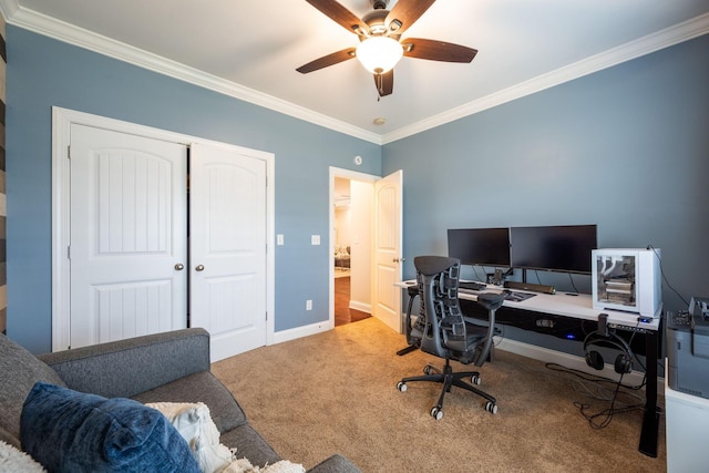 carpeted home office with ornamental molding, a ceiling fan, and baseboards