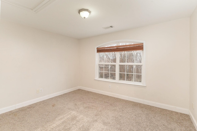 unfurnished room featuring carpet