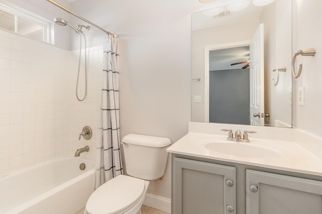 full bathroom featuring vanity, ceiling fan, toilet, and shower / bath combo