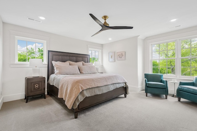 bedroom with ceiling fan and carpet