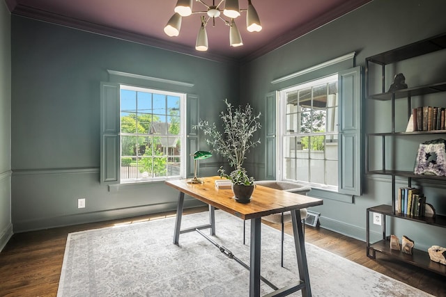 office space with a chandelier, dark hardwood / wood-style flooring, and ornamental molding