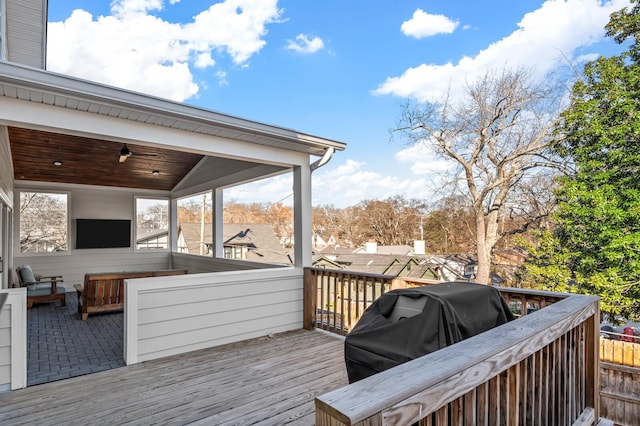 wooden deck featuring grilling area