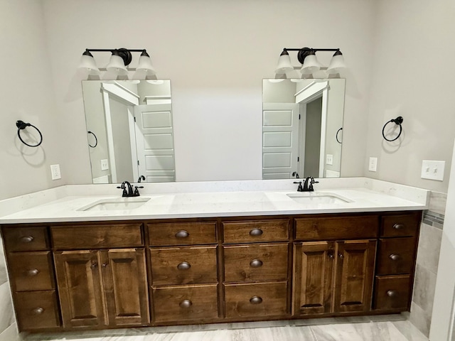 bathroom featuring hardwood / wood-style floors and vanity