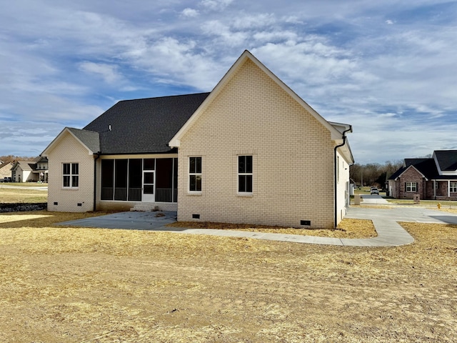 back of property featuring a patio area