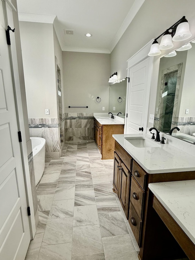 bathroom with crown molding, vanity, and independent shower and bath