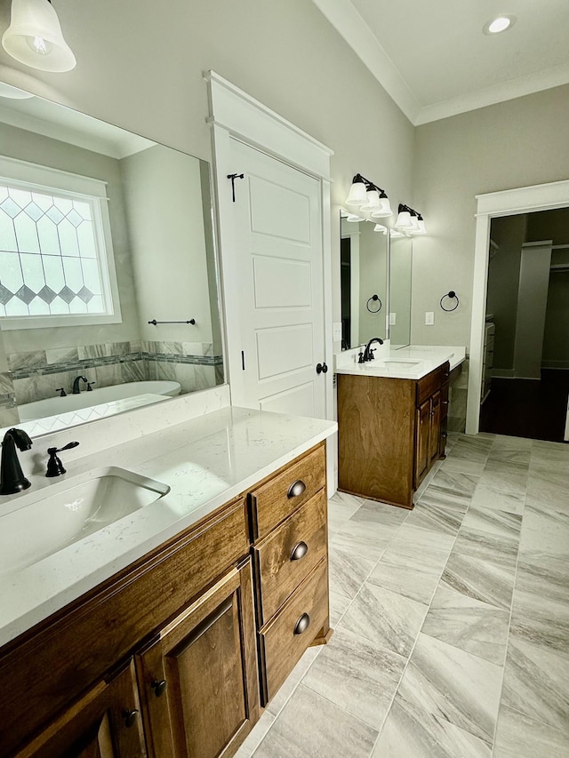 bathroom featuring vanity and ornamental molding