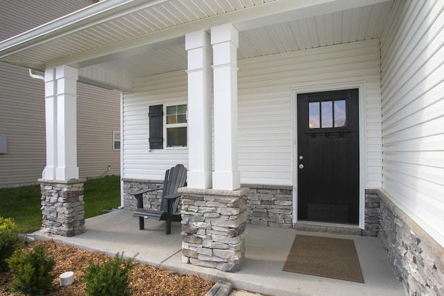 entrance to property with covered porch