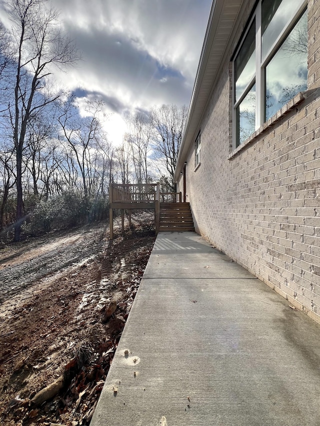 exterior space featuring a wooden deck