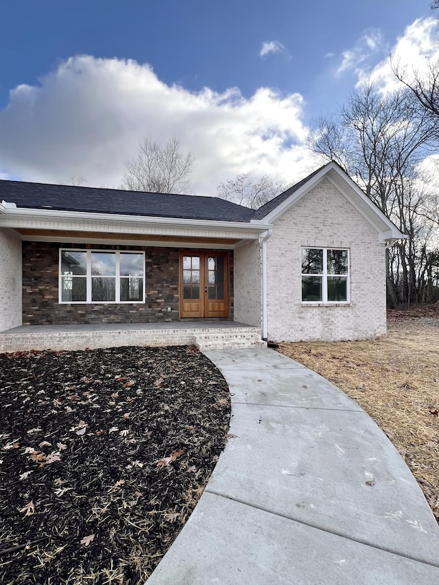 ranch-style house with french doors