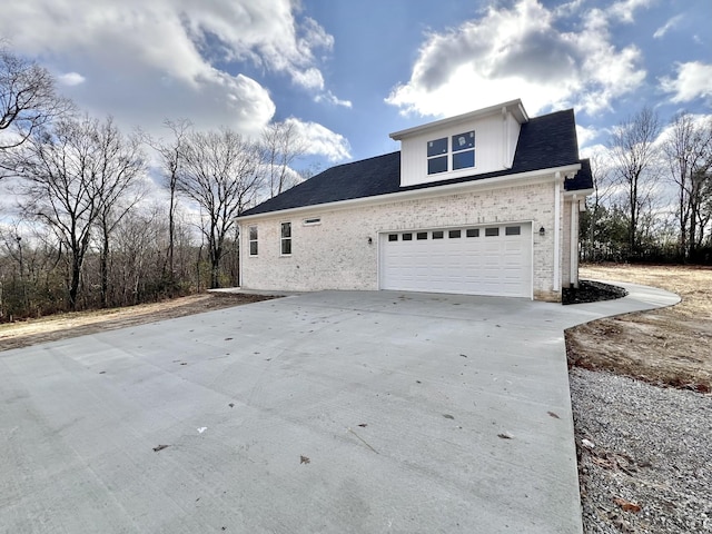 view of home's exterior featuring a garage