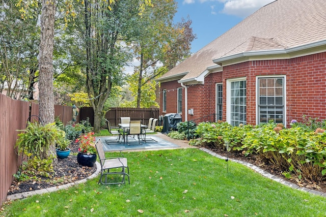 view of yard with a patio area