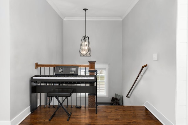 miscellaneous room featuring ornamental molding and dark hardwood / wood-style flooring