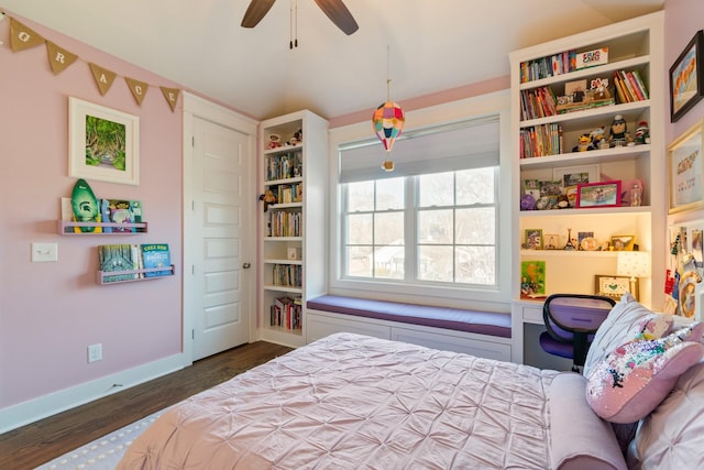 bedroom with dark hardwood / wood-style floors and ceiling fan