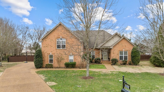 view of property featuring a front yard