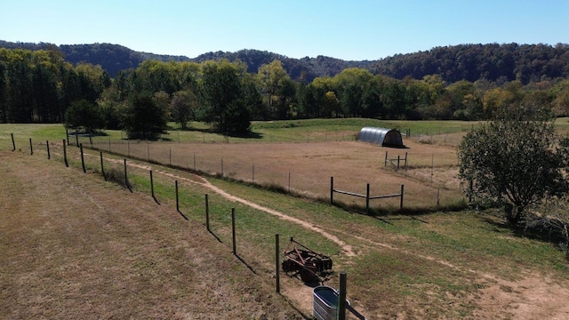 view of home's community featuring a rural view