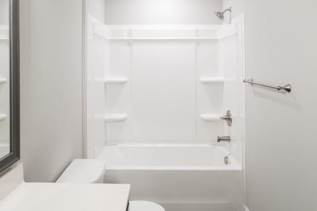 full bathroom with vanity, shower / bathtub combination, and toilet