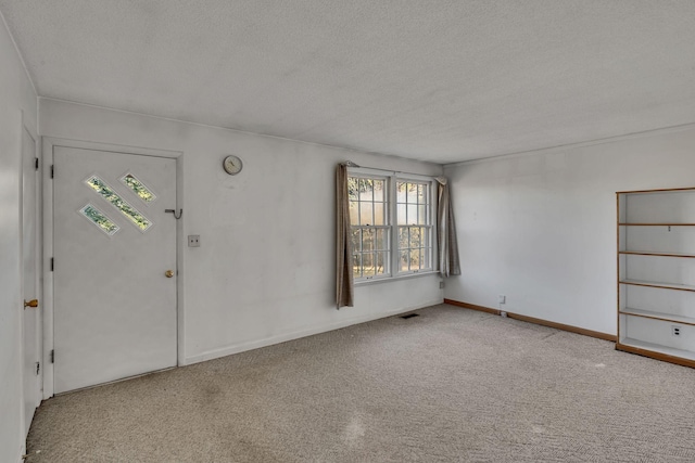 interior space with a textured ceiling