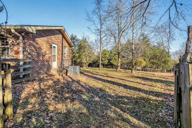 view of yard featuring central AC unit