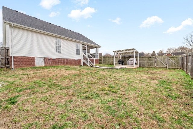 view of yard with a pergola and a patio area