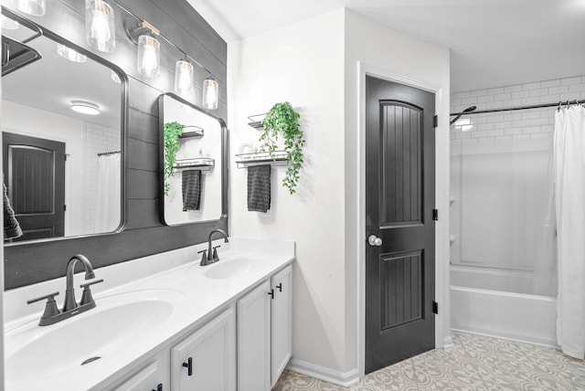 bathroom featuring vanity and shower / bathtub combination with curtain