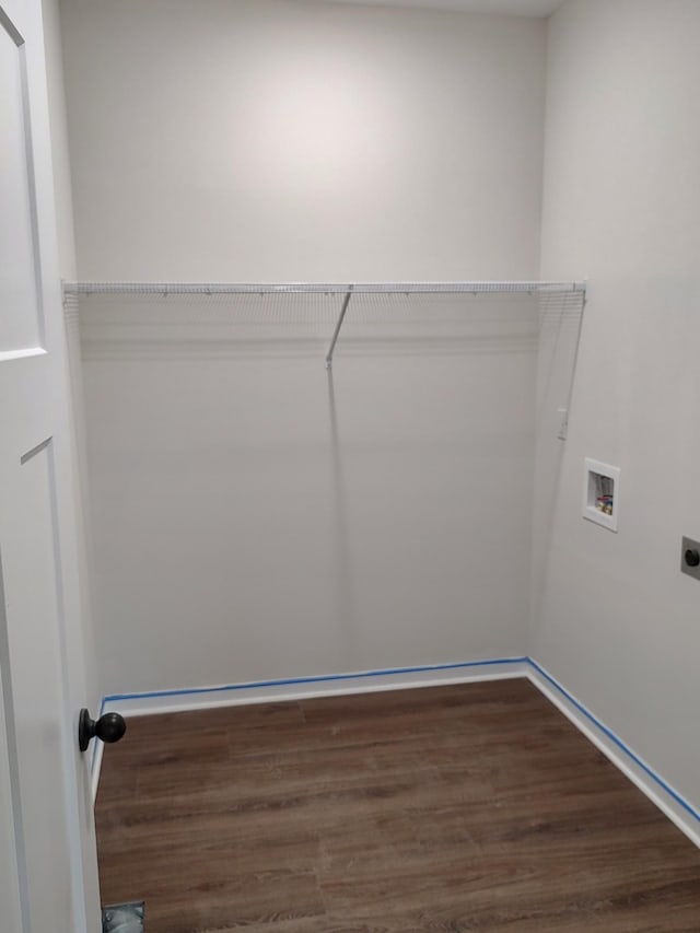 laundry area with washer hookup, dark hardwood / wood-style flooring, and electric dryer hookup