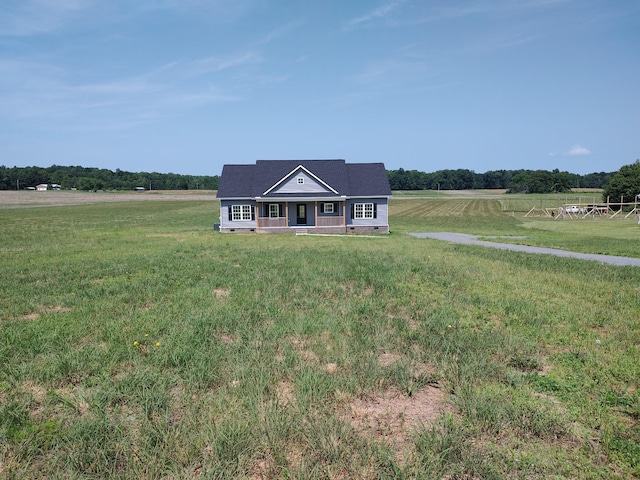 5058 Blue Springs Rd, Smithville, TN 37166 - view of front of house featuring a view of rural / pastoral area, a front lawn, and a porch