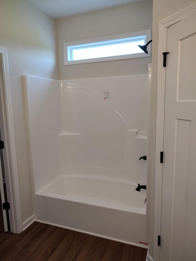 5058 Blue Springs Rd, Smithville, TN 37166 - bathroom featuring wood finished floors and shower / tub combination