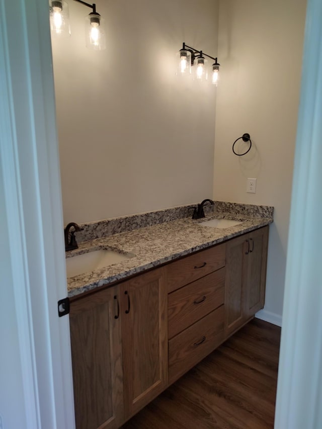 5058 Blue Springs Rd, Smithville, TN 37166 - bathroom with double vanity and wood finished floors