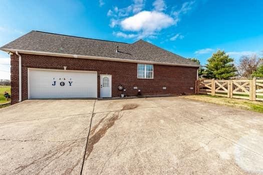 view of home's exterior with a garage