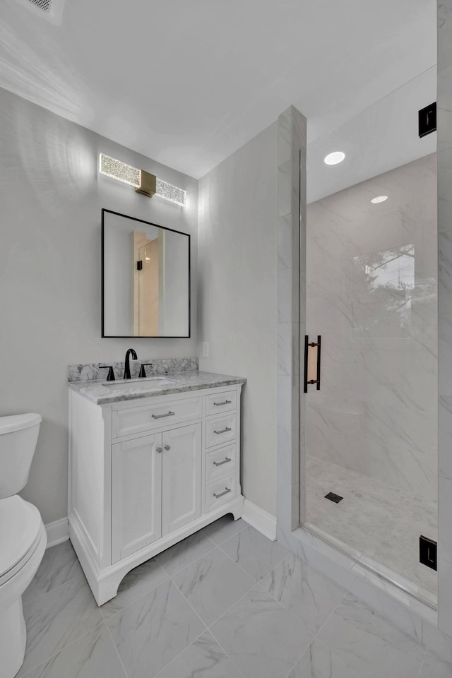 full bath with toilet, baseboards, marble finish floor, and a marble finish shower