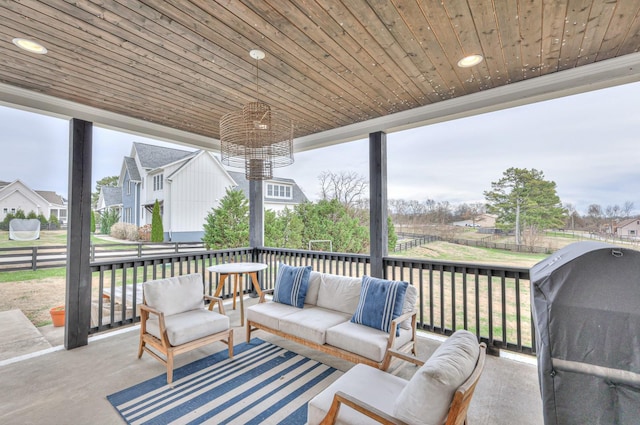 sunroom with wood ceiling