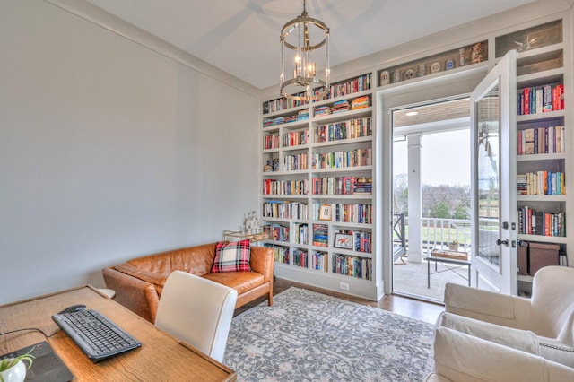 office with a chandelier and wood-type flooring