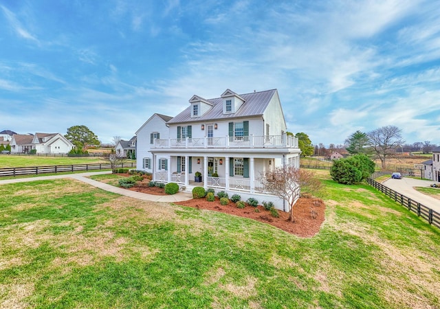 view of front of home featuring a porch and a front lawn