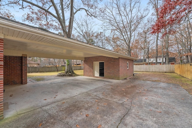 exterior space featuring a carport