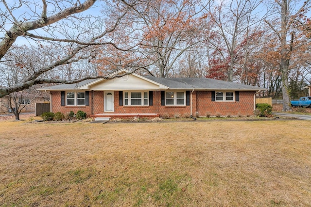 ranch-style house with a front yard