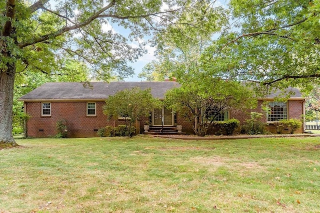 view of front facade with a front lawn