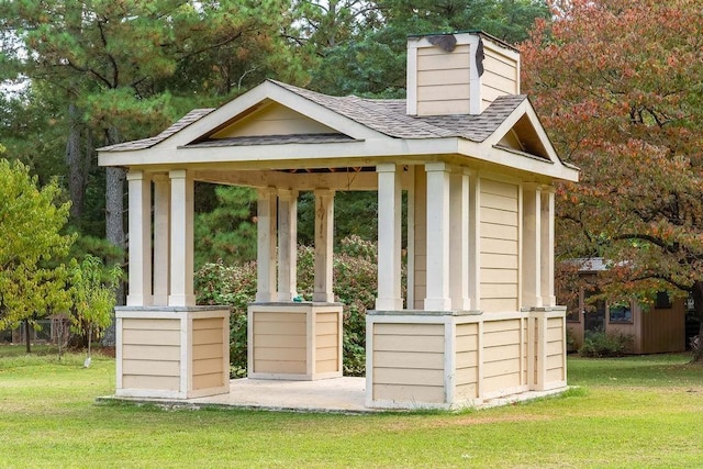 view of outbuilding featuring a gazebo and a yard