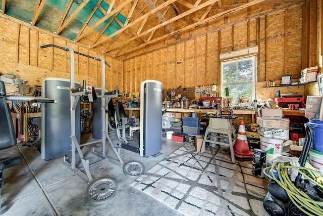 interior space featuring a workshop area and concrete floors