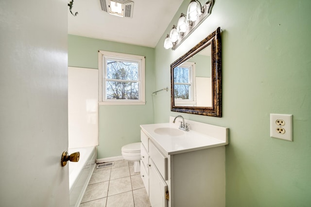 bathroom featuring tile patterned floors, vanity, and toilet