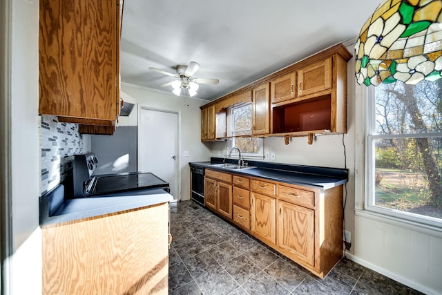 kitchen with range, black dishwasher, ceiling fan, and sink