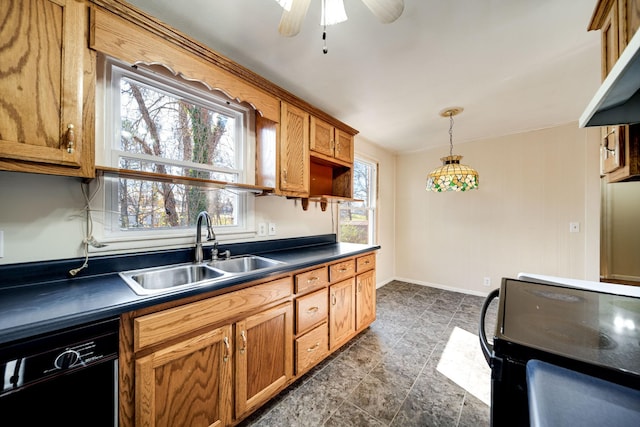 kitchen with black appliances, ceiling fan, sink, and decorative light fixtures